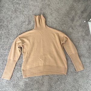 tan turtleneck sweater